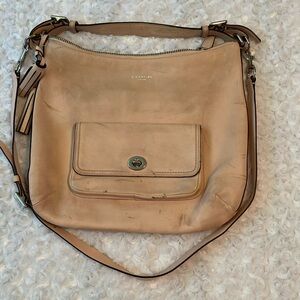 Coach Pink Handbag with shoulder strap.